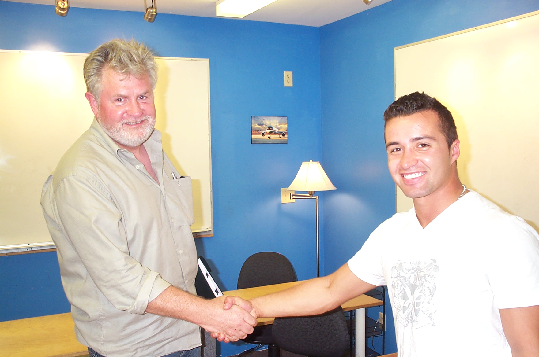 Andres Angulo with Paul Harris.  Langley Flying School.